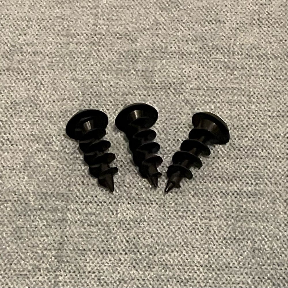Three Black Plastic Screws